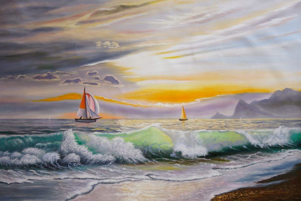 schilderij golven, vuurtoren en bootje